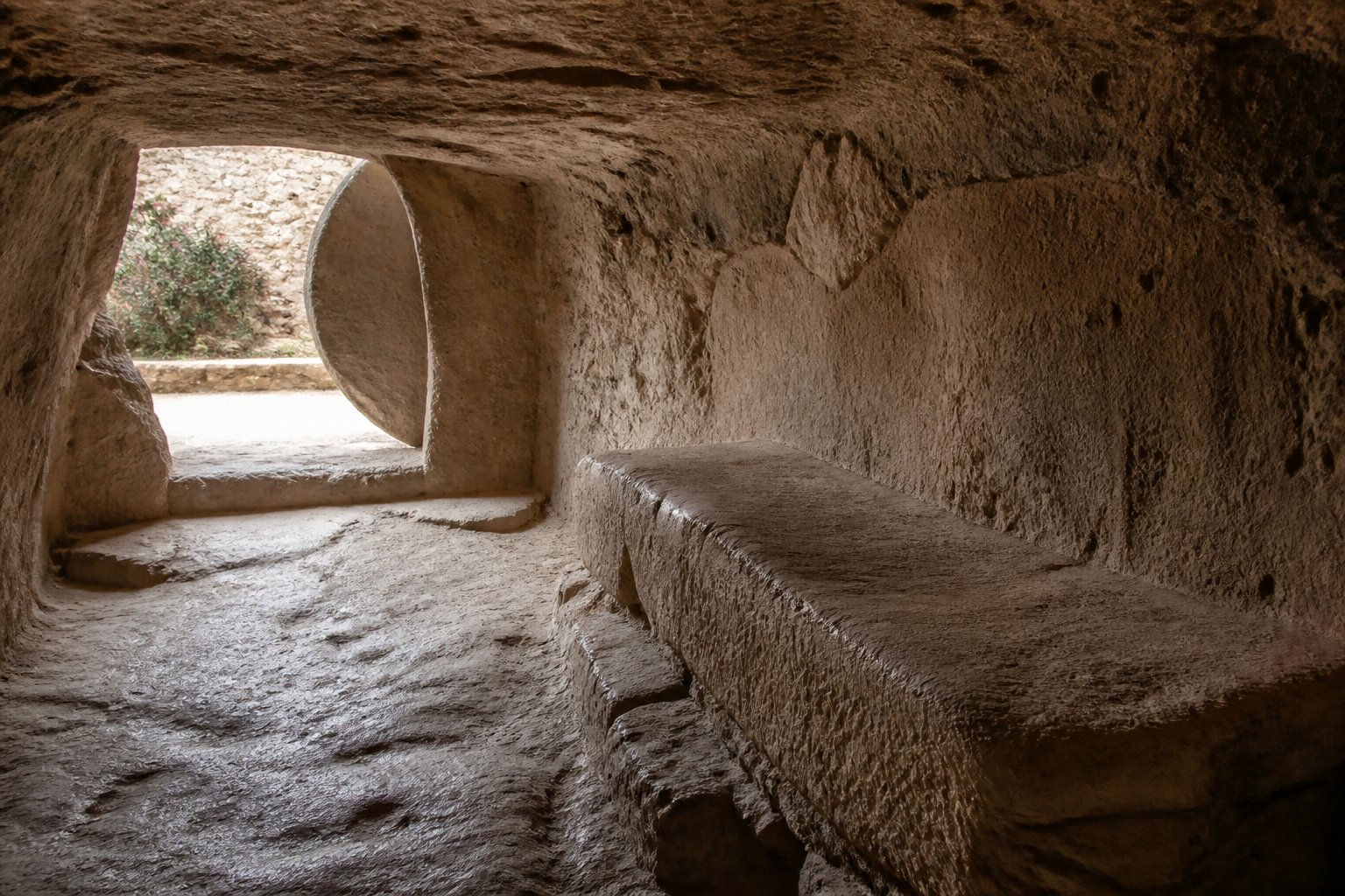 Ancient rock-cut tomb in Jerusalem illustrating how big was Jesus' tomb.